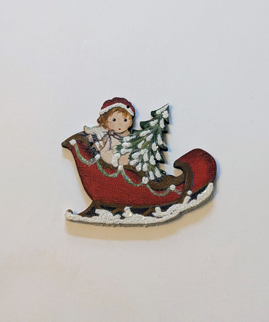 Ange dans le traîneau 🇩🇪