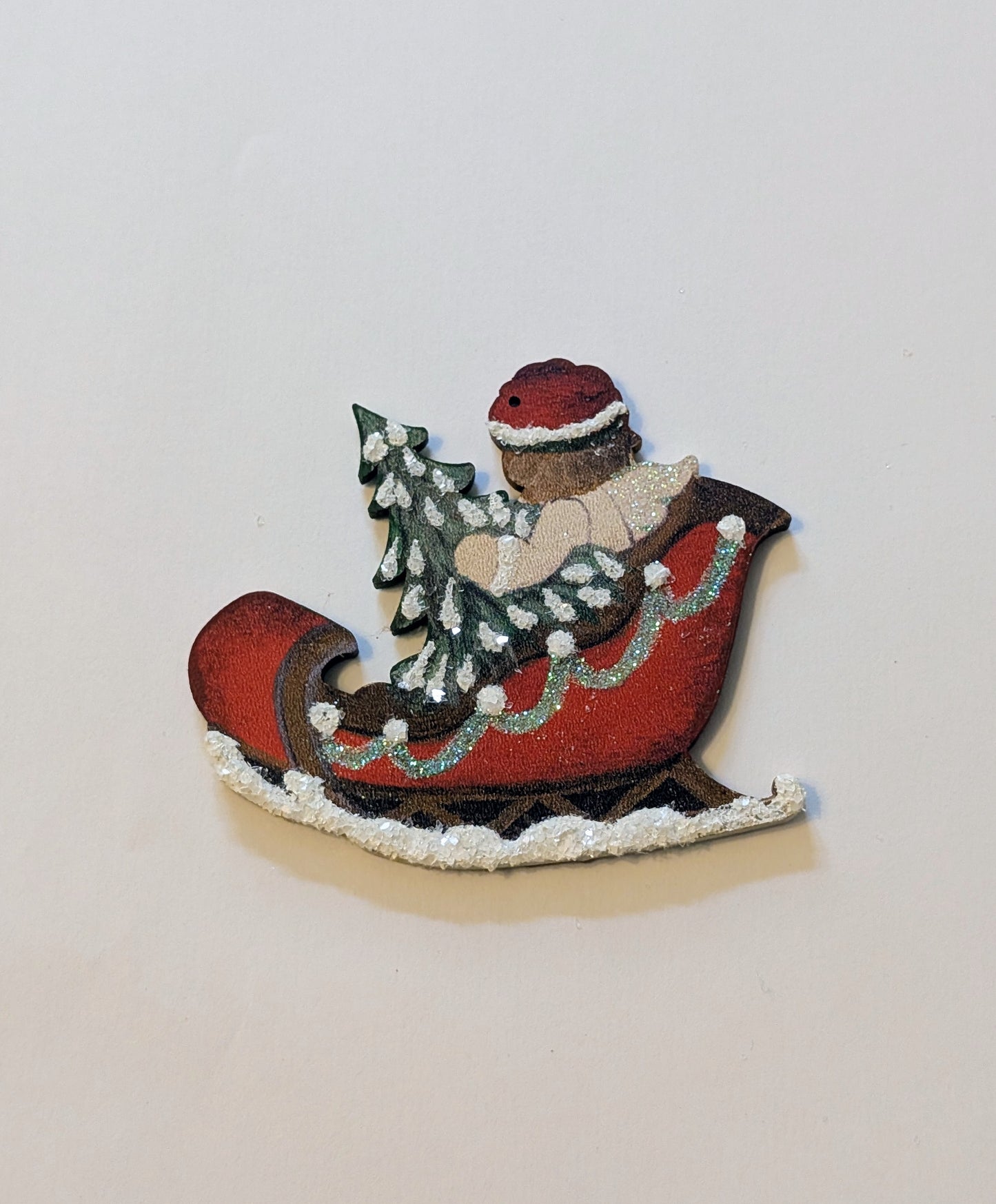 Ange dans le traîneau 🇩🇪