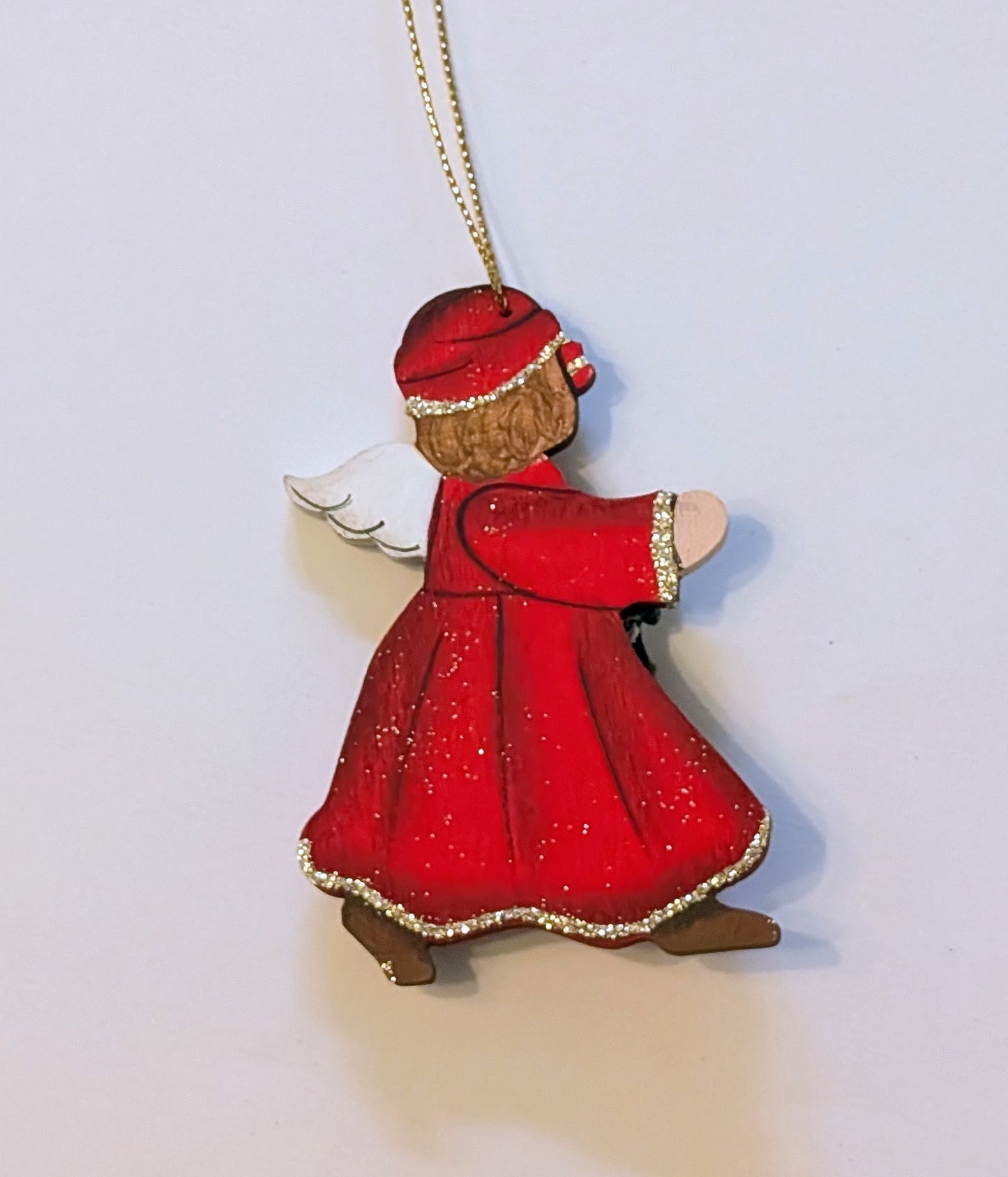 Ange en manteau rouge 🇩🇪