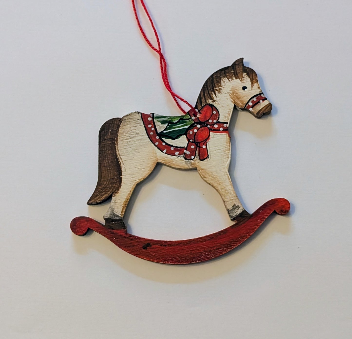 Cheval à bascule 🇩🇪