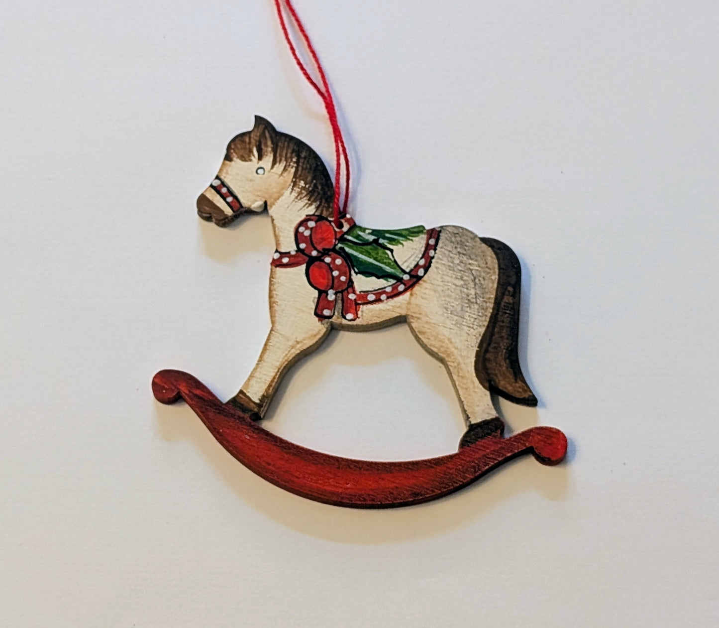 Cheval à bascule 🇩🇪